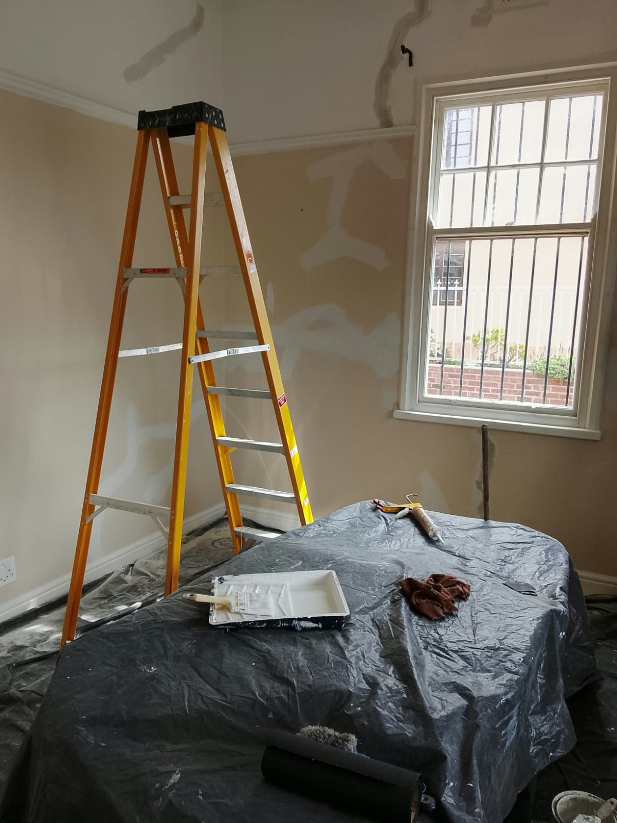 Interior repaint prep, crack repairs under way