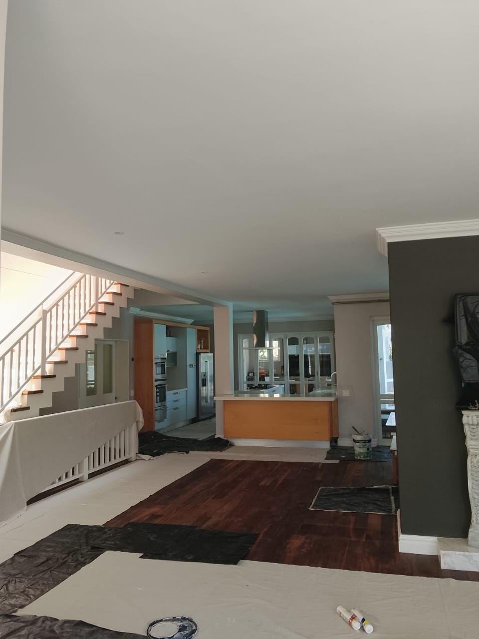 Open-plan lounge and kitchen repaint