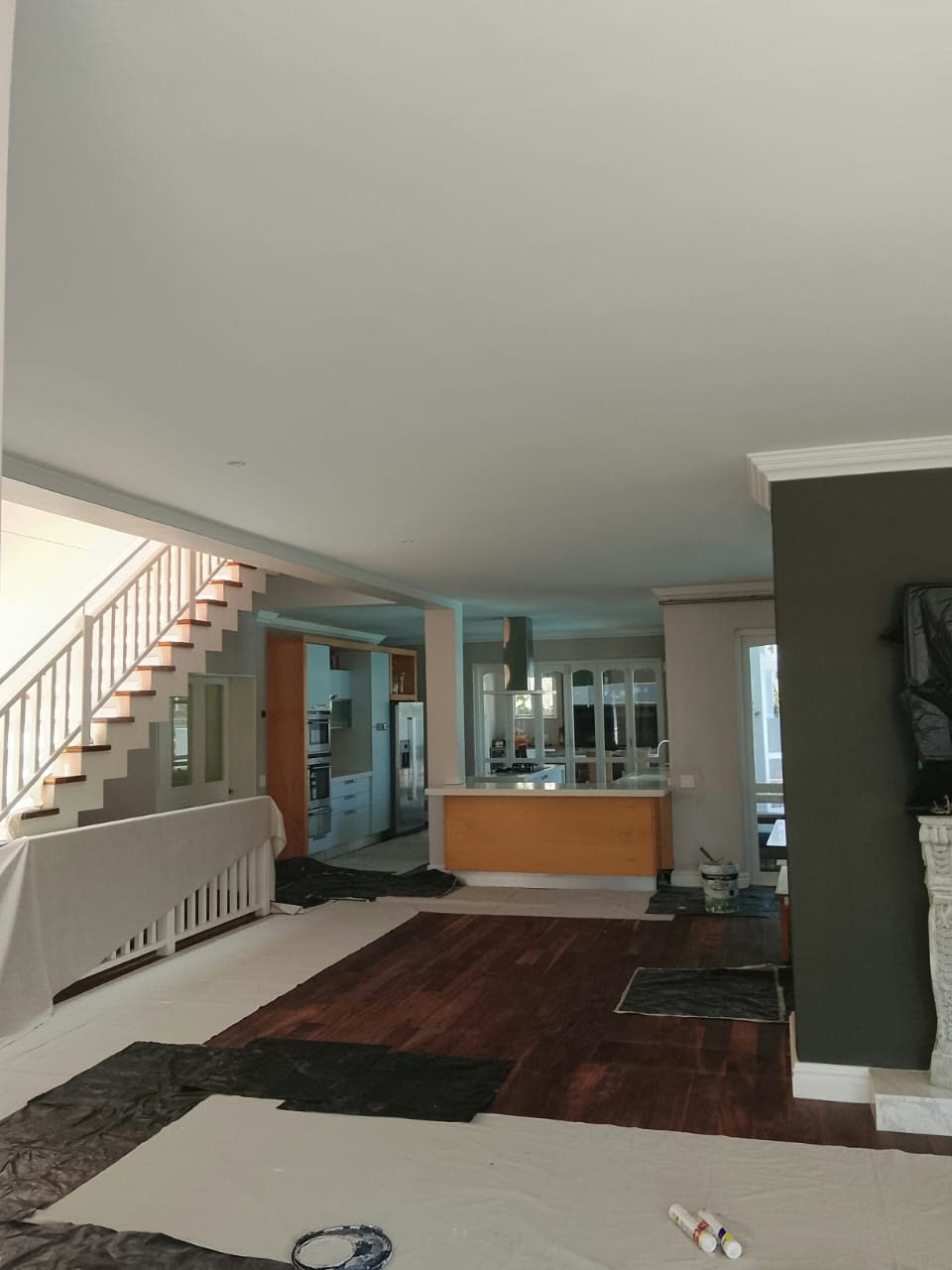 Open-plan interior repaint in progress