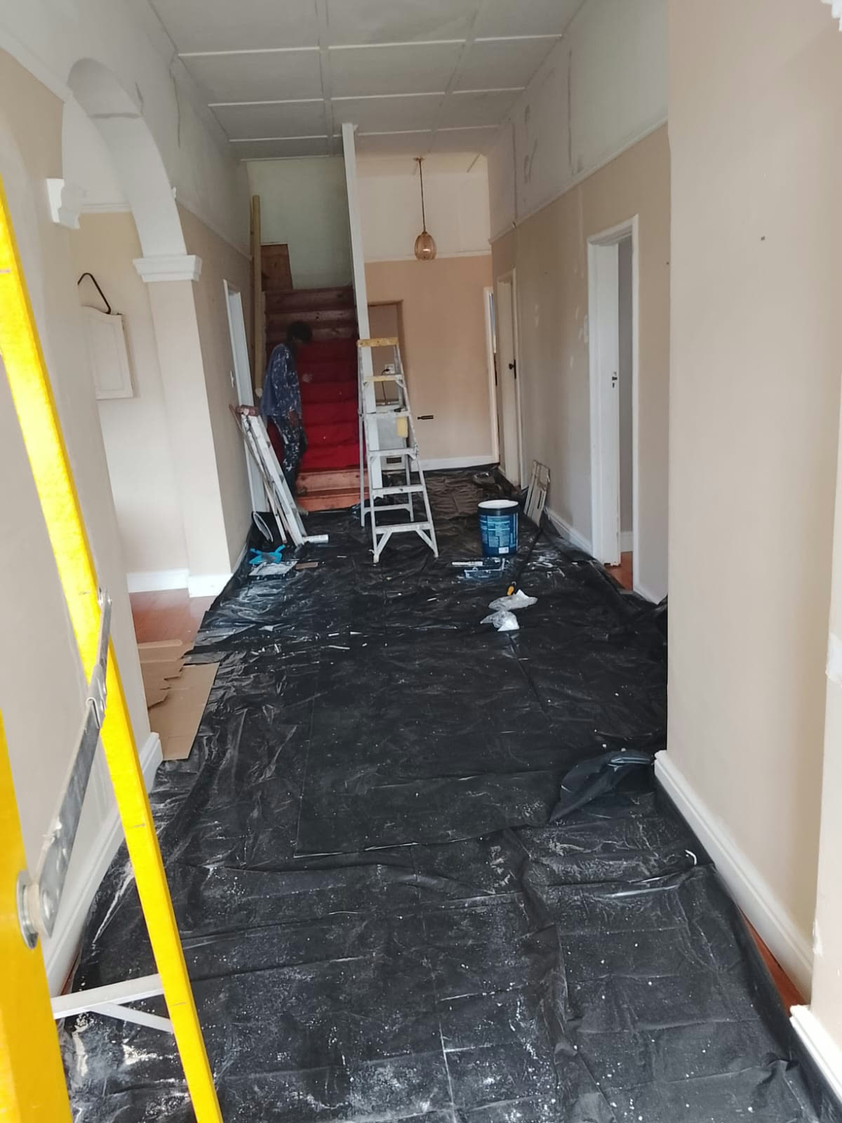 Full hallway repaint, floors protected and prepped