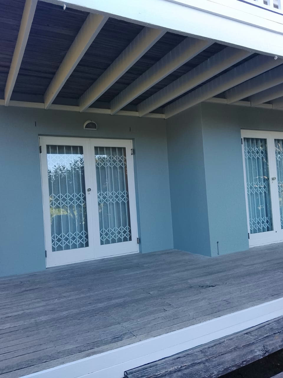 Wooden deck and French doors refinished