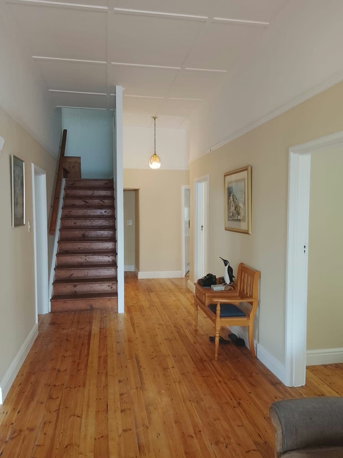 Hallway repaint with restored wooden floors